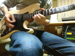 Playing Stratocaster